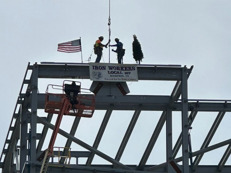 mid-city-steel-project-experience-institutional-fabrication-two-workers-iron-local-on-structure--800x600
