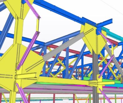 Mid-City Steel 3D structural steel model in Tekla Structures showing detailed framing, connections, bracing, and connection plates.